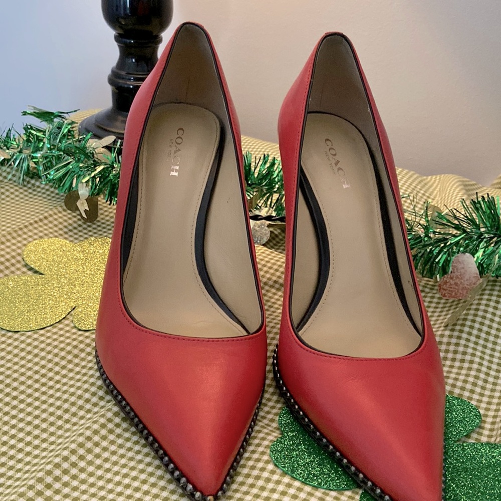 Size 7B Coach pumps.